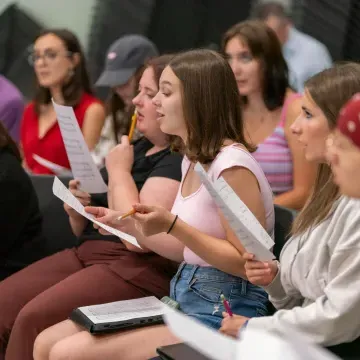 choral classroom, women's choir rehearsing 